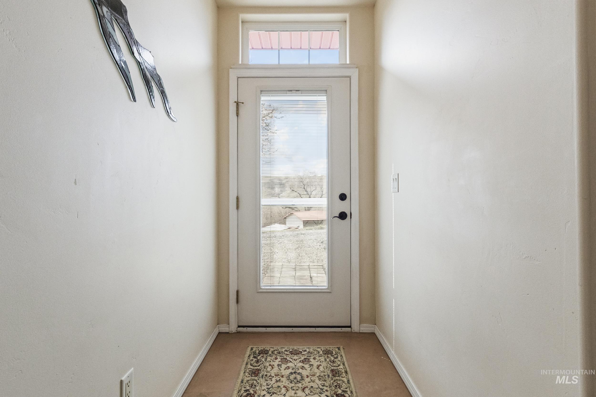 382 River Road Bliss, ID 83314 - Photo 27 of 46 Doorway with baseboards