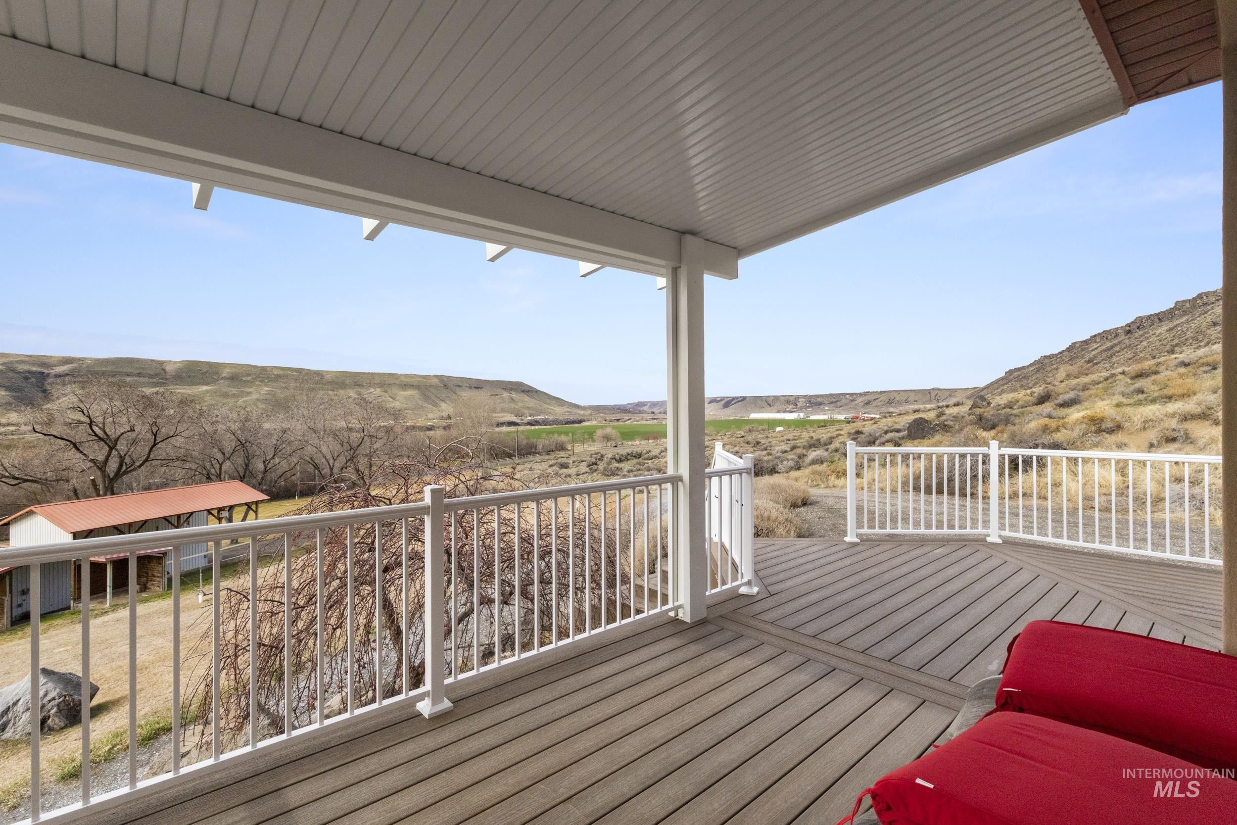 382 River Road Bliss, ID 83314 - Photo 35 of 46 Wooden terrace featuring a mountain view