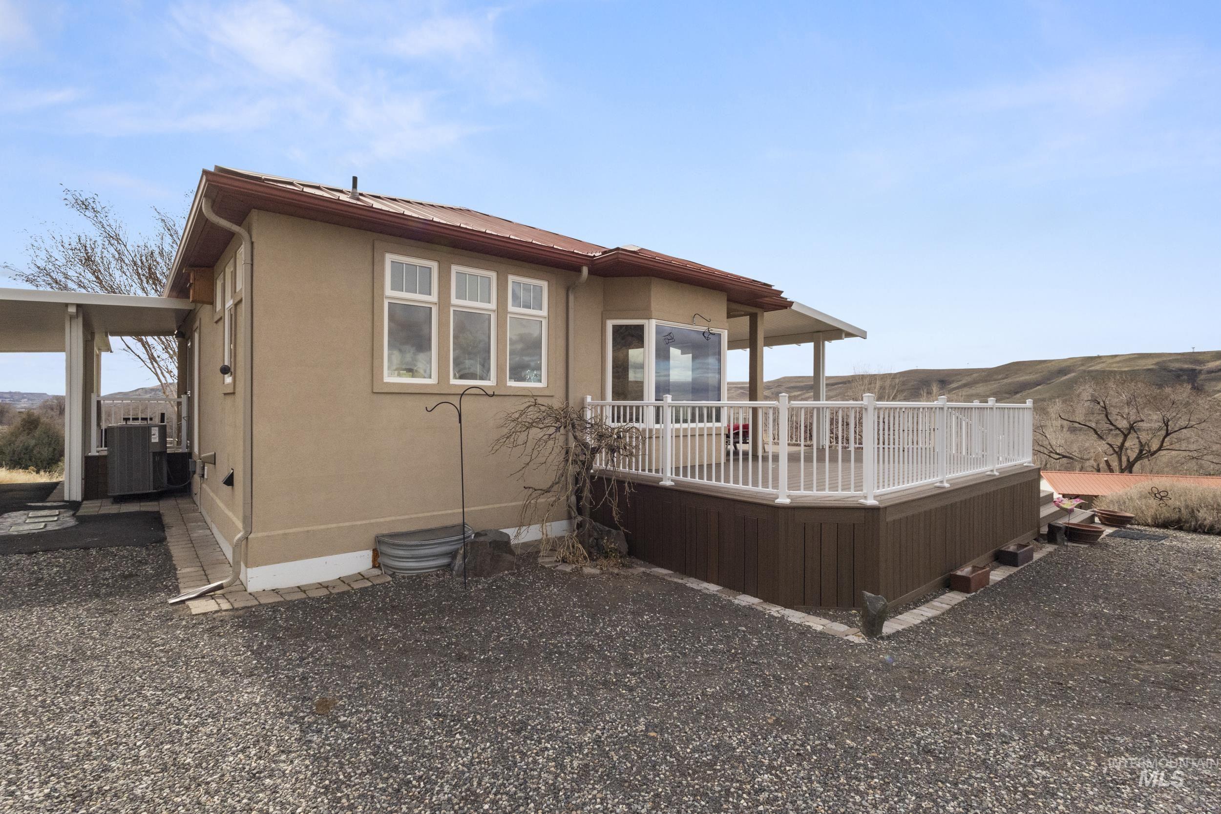 382 River Road Bliss, ID 83314 - Photo 36 of 46 Back of house with a deck