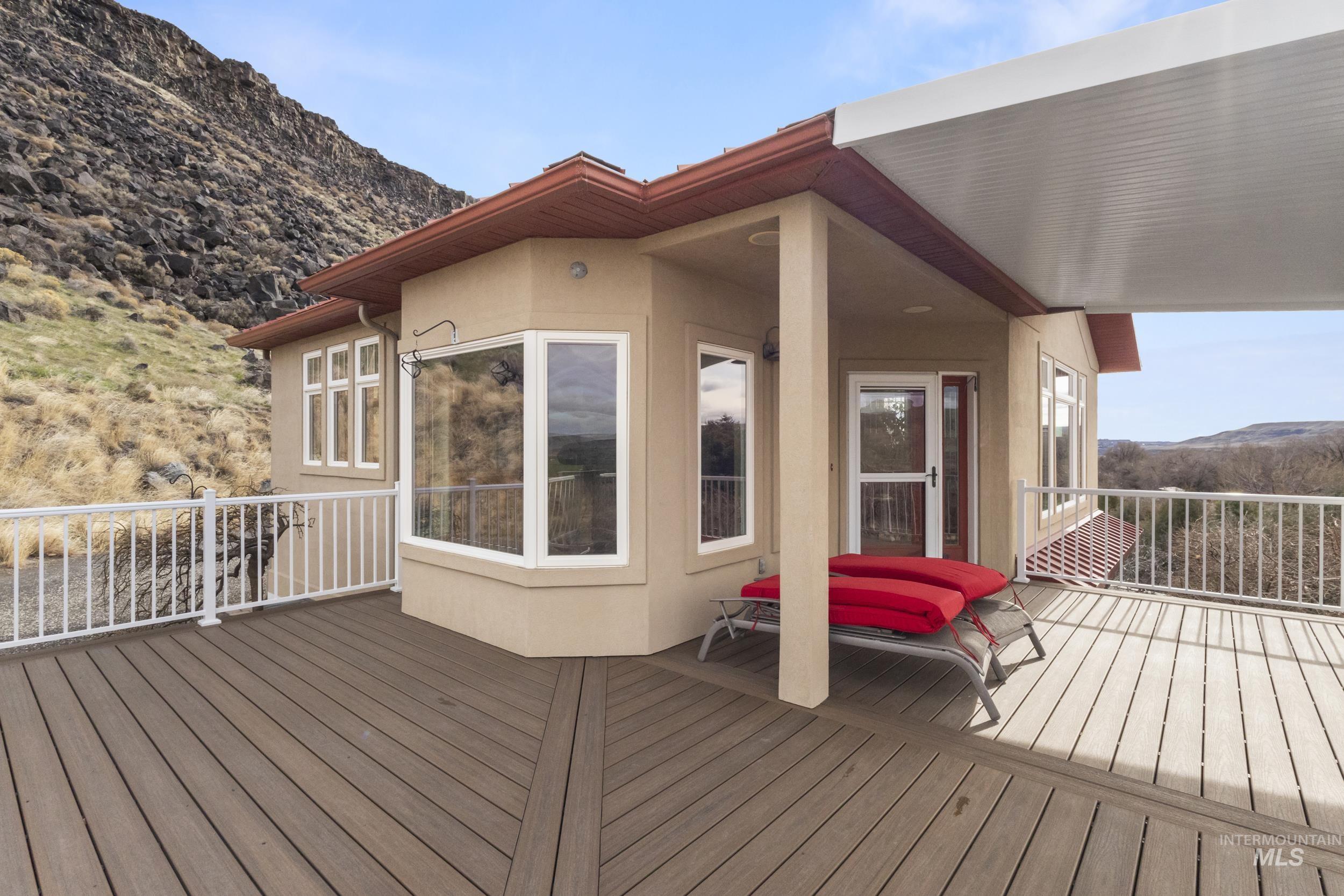 382 River Road Bliss, ID 83314 - Photo 4 of 46 Wooden deck featuring a mountain view