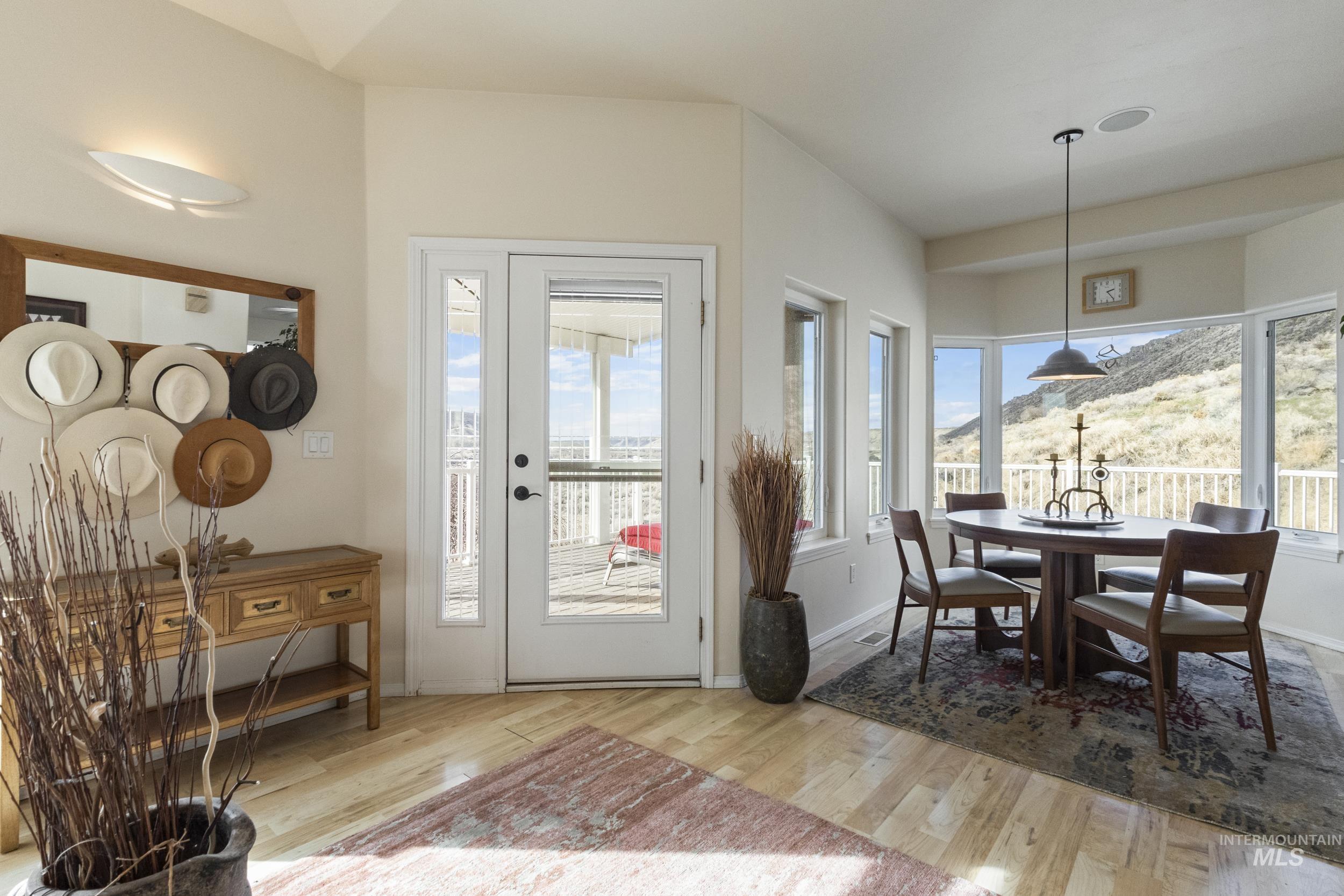 382 River Road Bliss, ID 83314 - Photo 5 of 46 Dining space featuring light wood-style floors