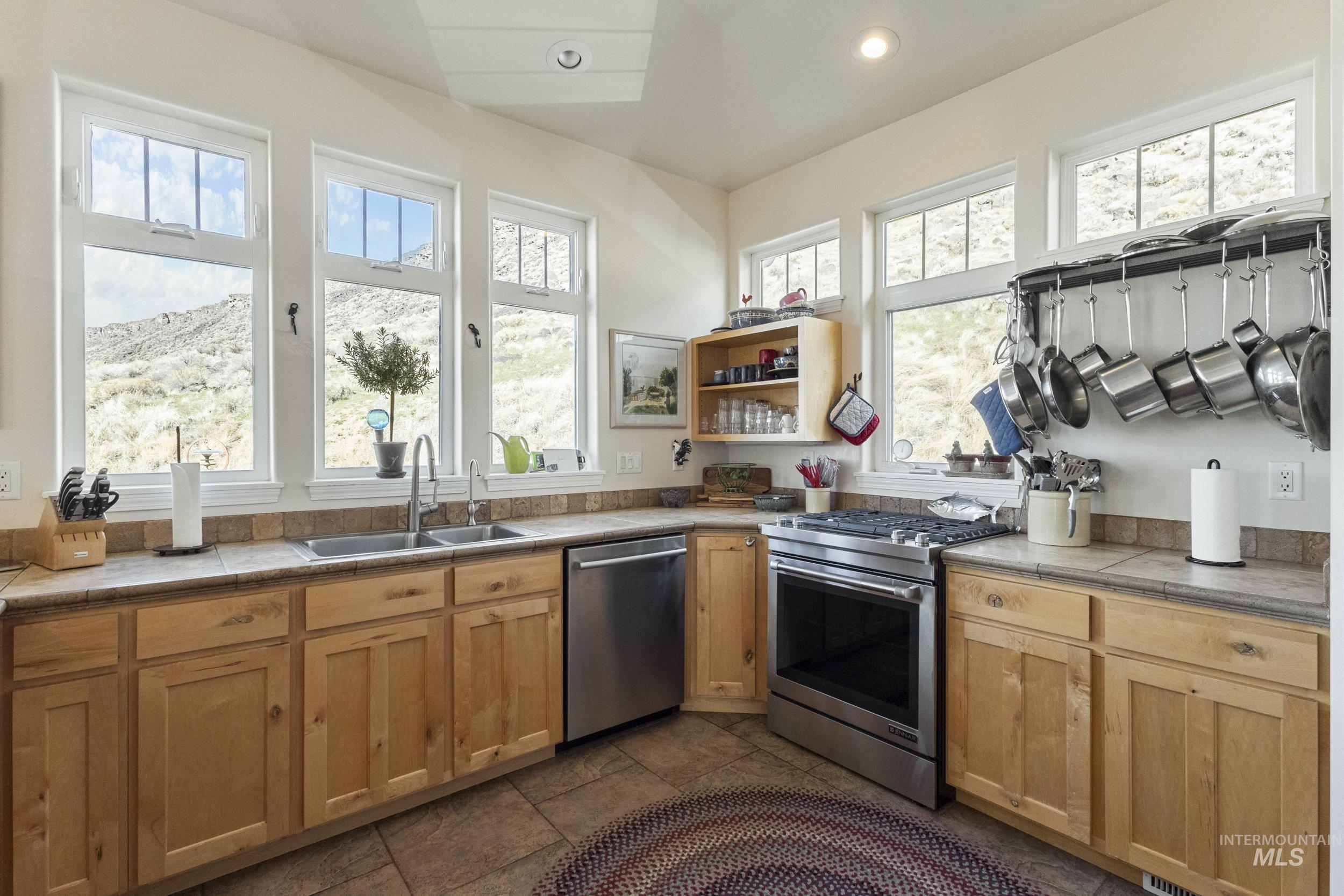 382 River Road Bliss, ID 83314 - Photo 8 of 46 Kitchen featuring stainless steel appliances, light wood finish cabinetry, open shelves, and recessed lighting