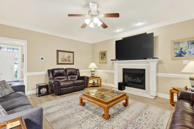 a kitchen with granite countertop wooden floors furniture and appliances