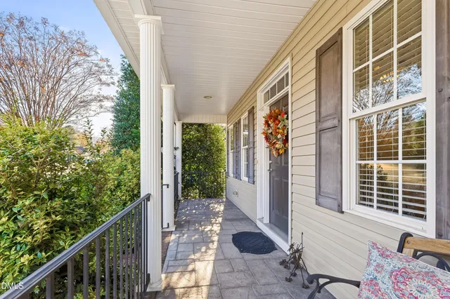 a view of entryway with wooden floor and stairs