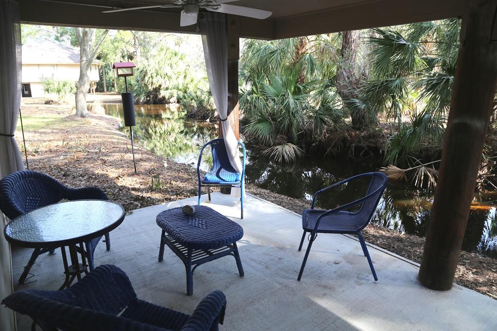 828 Club Cottage Road Edisto Beach, SC 29438 - Photo 14 of 19 under sitting area