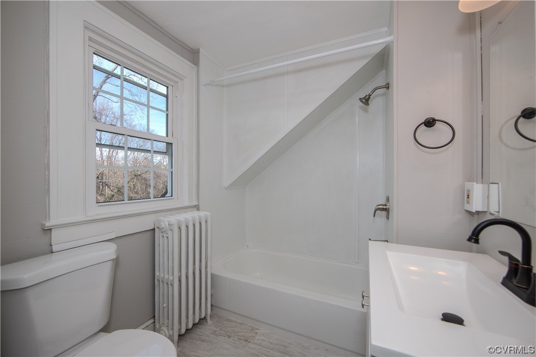 2212 Springston Road Wilsons, VA 23894 - Photo 32 of 39 a bathroom with a toilet a sink and bathtub