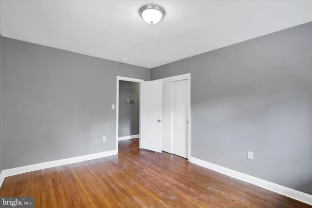 a large white room with a large window