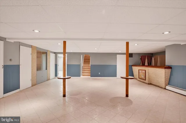 a view of balcony with wooden floor and fence