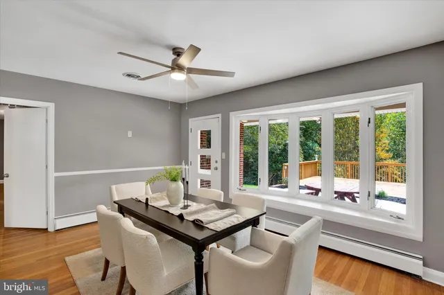 a kitchen with stainless steel appliances a refrigerator sink and cabinets