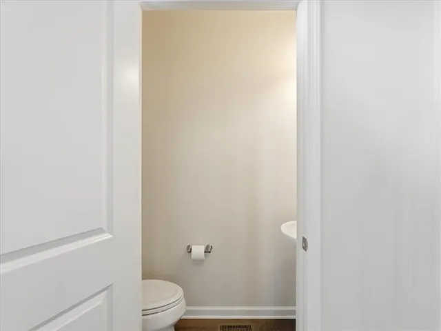 a bedroom with bed and window