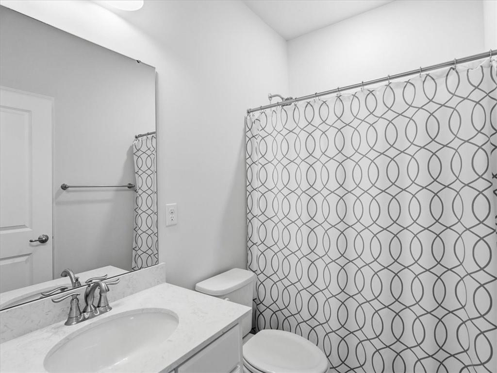 828 Oneida Circle Mars, PA 16046 - Photo 23 of 30 a bathroom with a sink mirror and toilet