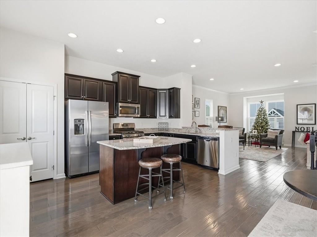 828 Oneida Circle Mars, PA 16046 - Photo 7 of 30 a large kitchen with a table and chairs