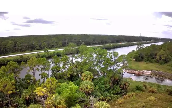 a view of a lake with a city