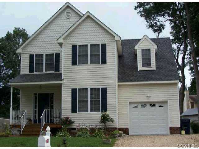 921 Jamestown Road Colonial Heights, VA 23834 - Photo 1 of 1 front view of a house with a yard