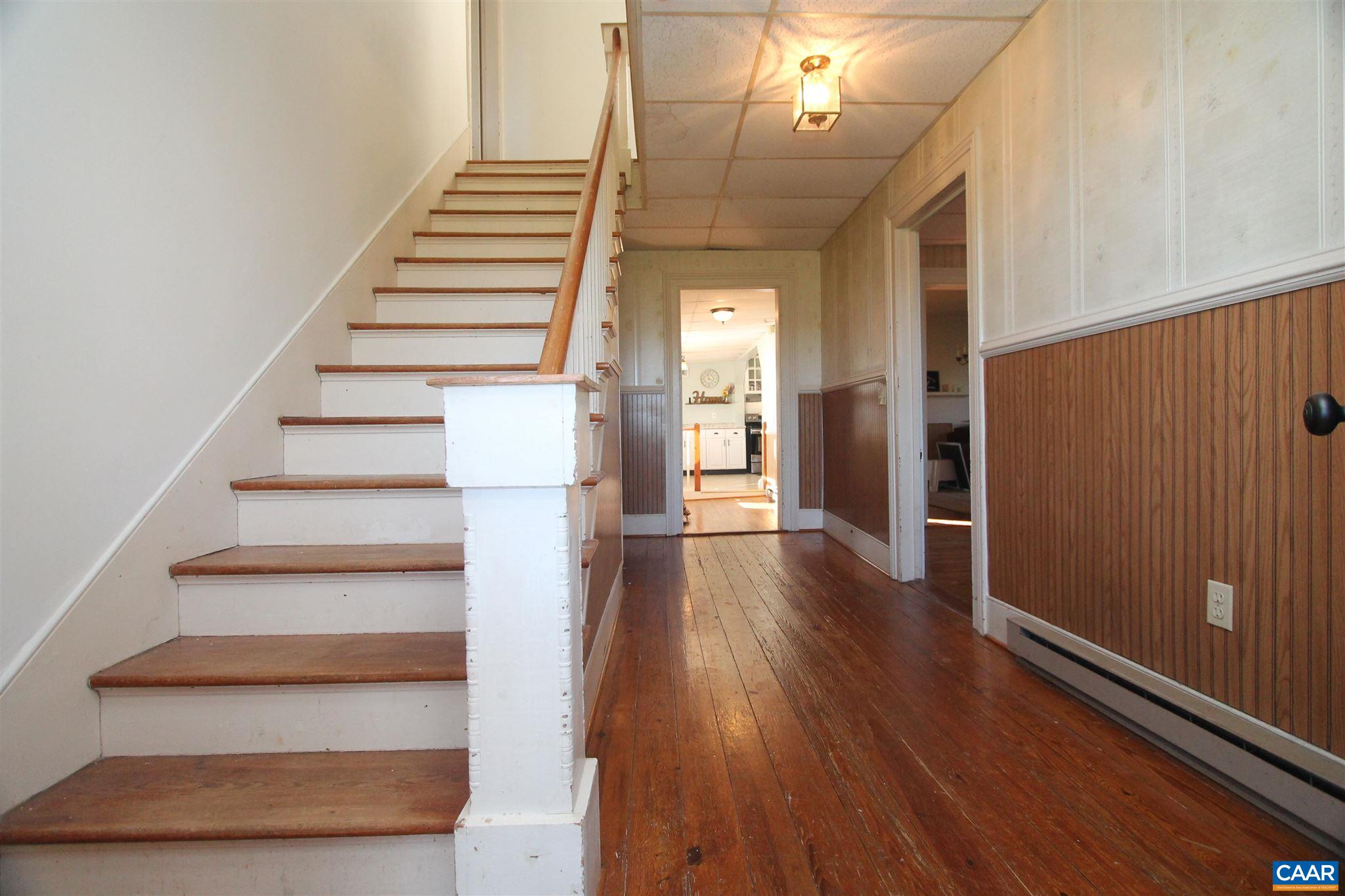 355 Gibbs Road Madison, VA 22727 - Photo 12 of 33 a view of entryway and hall with wooden floor