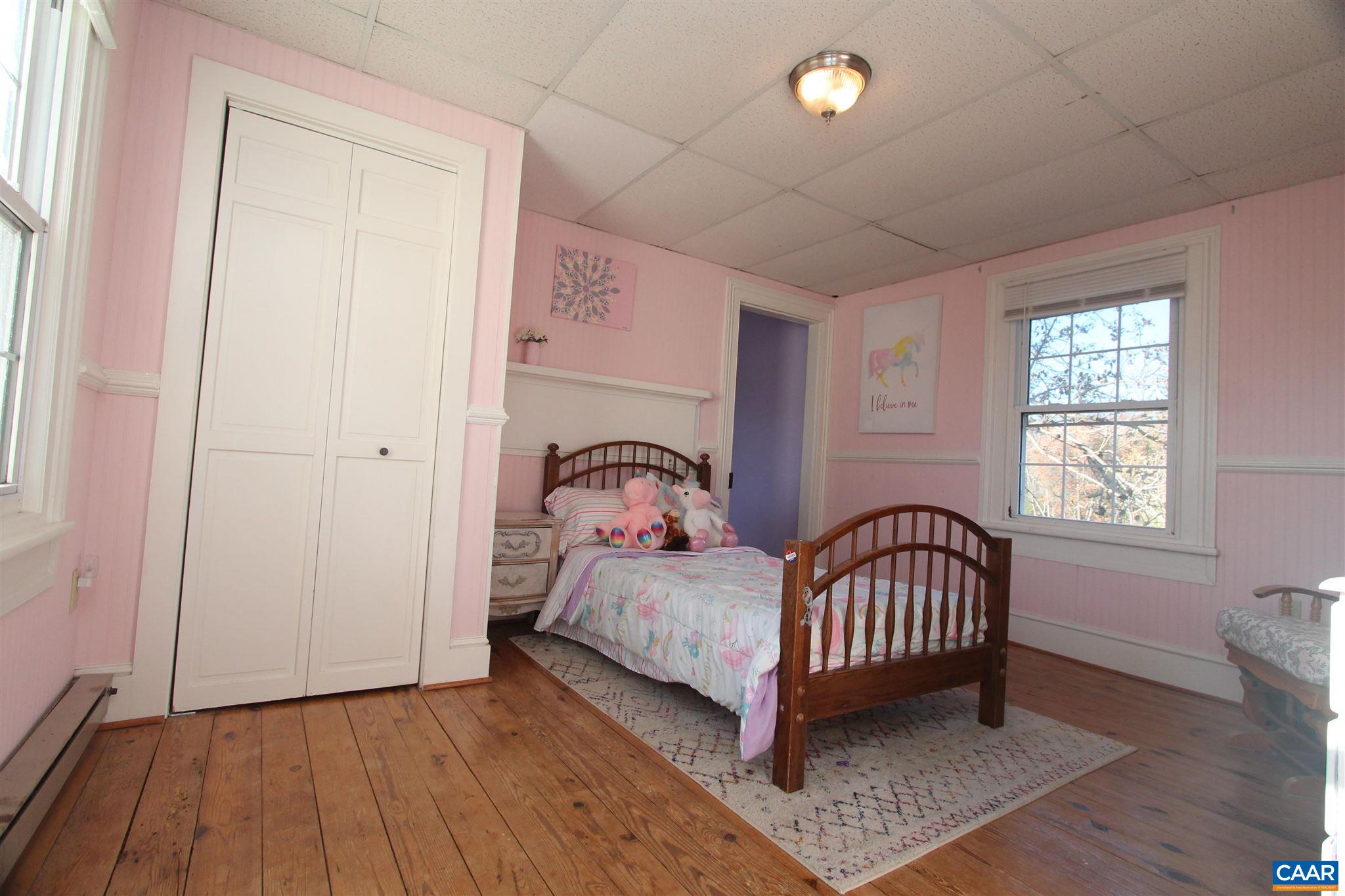355 Gibbs Road Madison, VA 22727 - Photo 22 of 33 a bedroom with a bed and a window