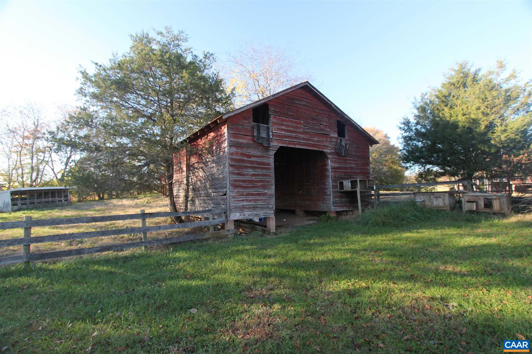 355 Gibbs Road Madison, VA 22727 - Photo 25 of 33 a view of a backyard with large trees