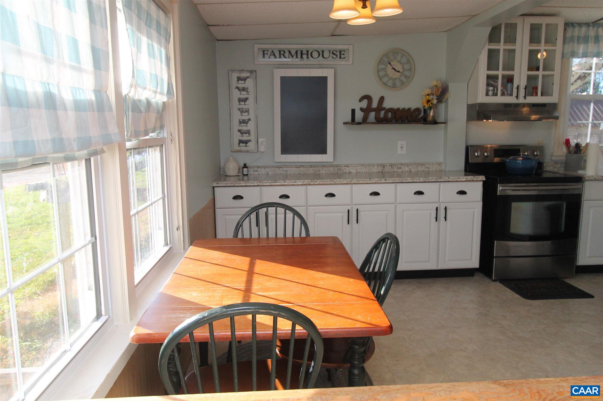 355 Gibbs Road Madison, VA 22727 - Photo 7 of 33 a view of a kitchen with a sink and cabinets