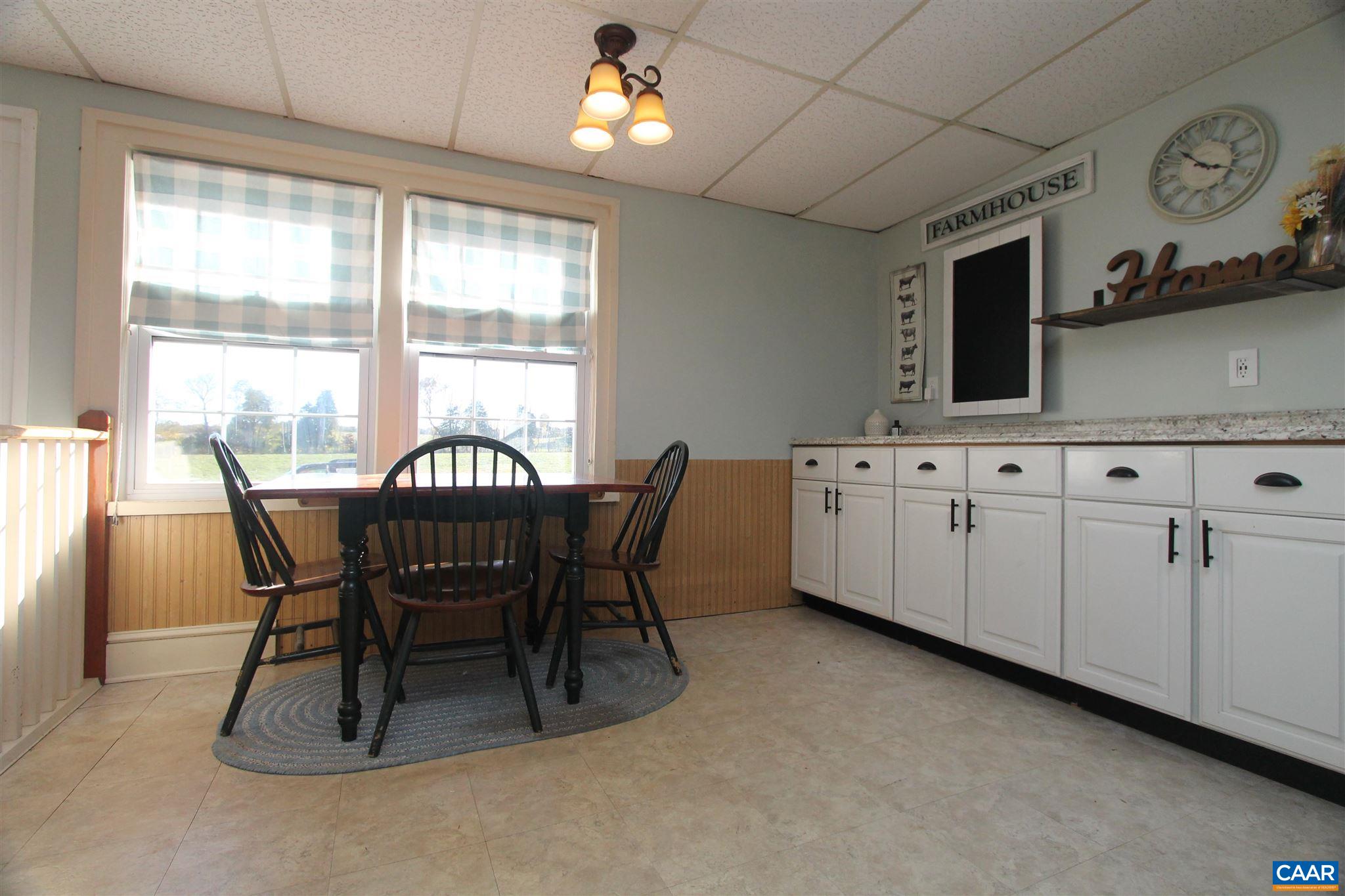 355 Gibbs Road Madison, VA 22727 - Photo 8 of 33 a view of a dining room with furniture window and outside view
