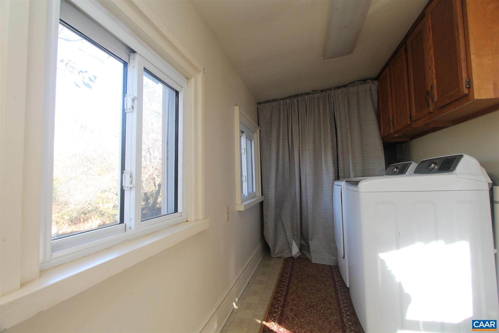 355 Gibbs Road Madison, VA 22727 - Photo 9 of 33 a utility room with closet dryer and washer