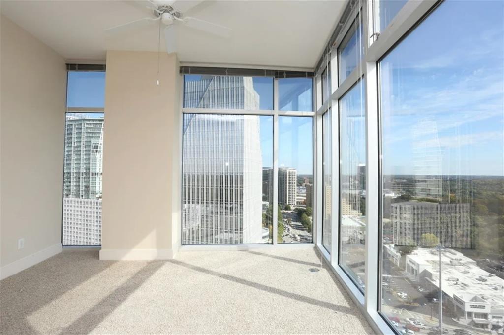 3242 Peachtree Road Northeast, Unit 301 Atlanta, GA 30305 - Photo 14 of 41 a view of a room with a balcony