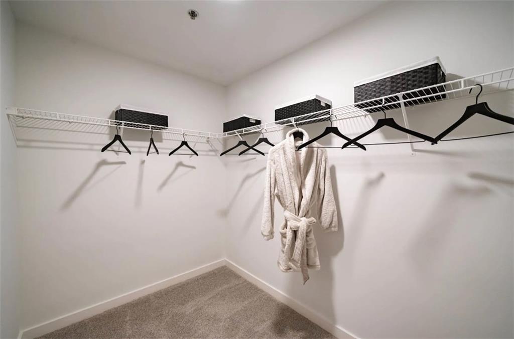 3242 Peachtree Road Northeast, Unit 301 Atlanta, GA 30305 - Photo 23 of 41 a view of a room with gym equipment