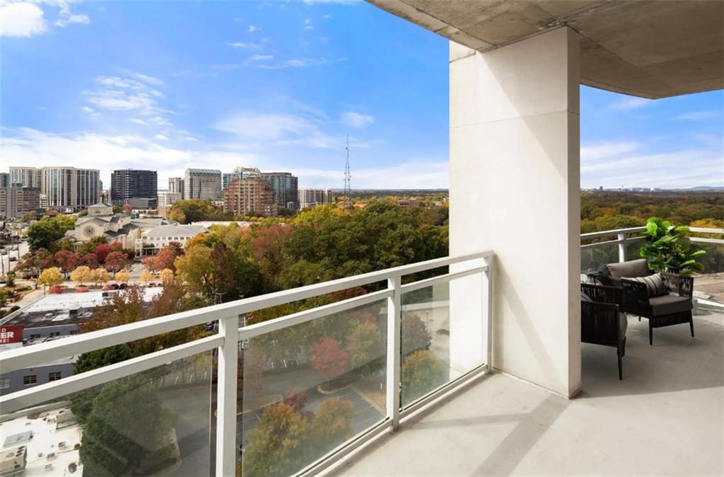 3242 Peachtree Road Northeast, Unit 301 Atlanta, GA 30305 - Photo 25 of 41 a view of a balcony with city view