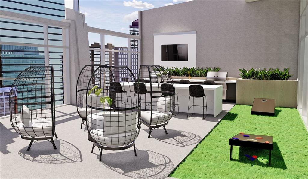 3242 Peachtree Road Northeast, Unit 301 Atlanta, GA 30305 - Photo 39 of 41 a living room with patio furniture and a fireplace