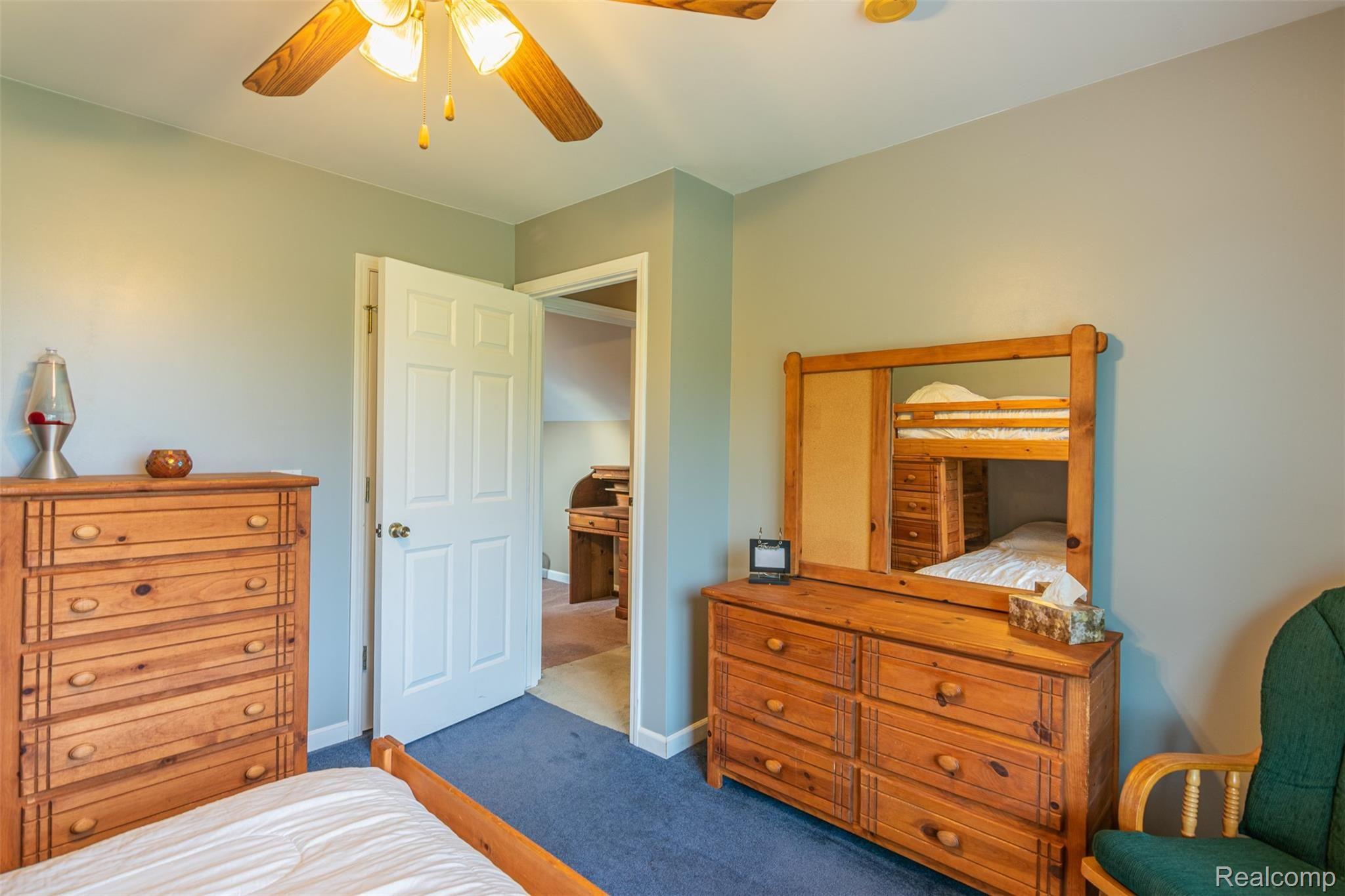 10151 Meskill Road Columbus, MI 48063 - Photo 24 of 39 Upstairs bedroom overlooking property and also features a walk-in closet (behind door).