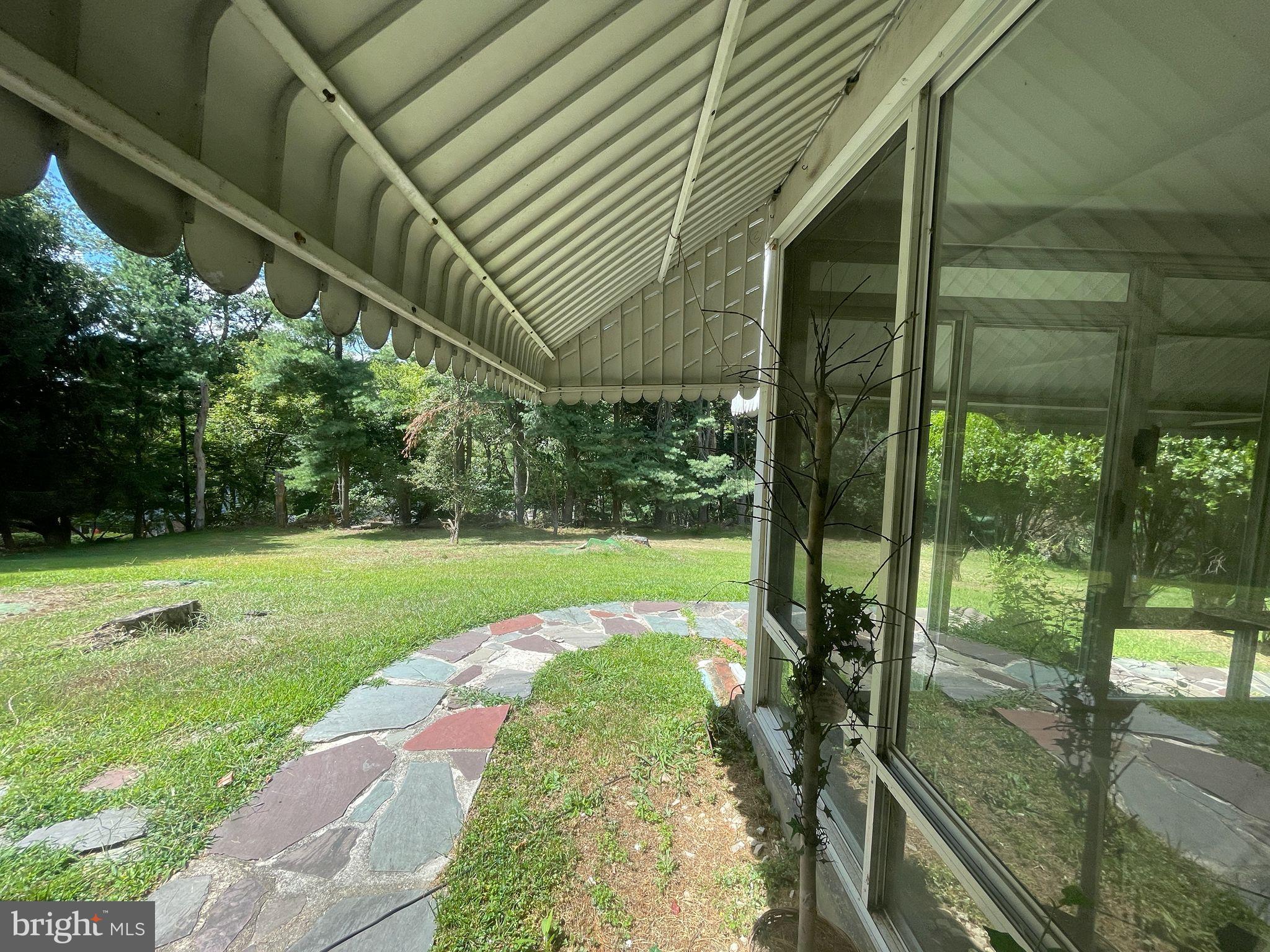 464 Conard Drive Springfield, PA 19064 - Photo 19 of 22 Serene garden view from a cozy porch.