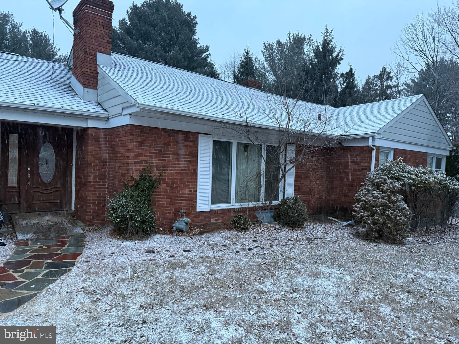 464 Conard Drive Springfield, PA 19064 - Photo 21 of 22 Charming brick home dusted with snow.