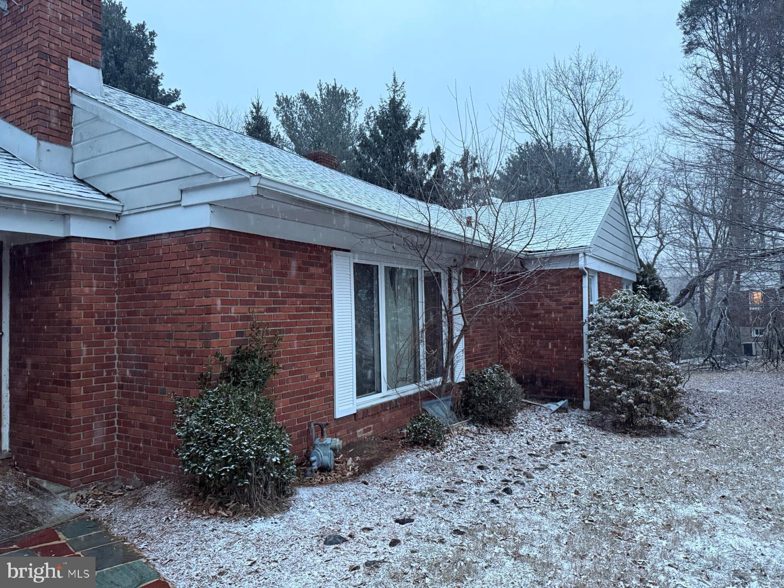 464 Conard Drive Springfield, PA 19064 - Photo 3 of 22 Charming brick home dusted with snow.