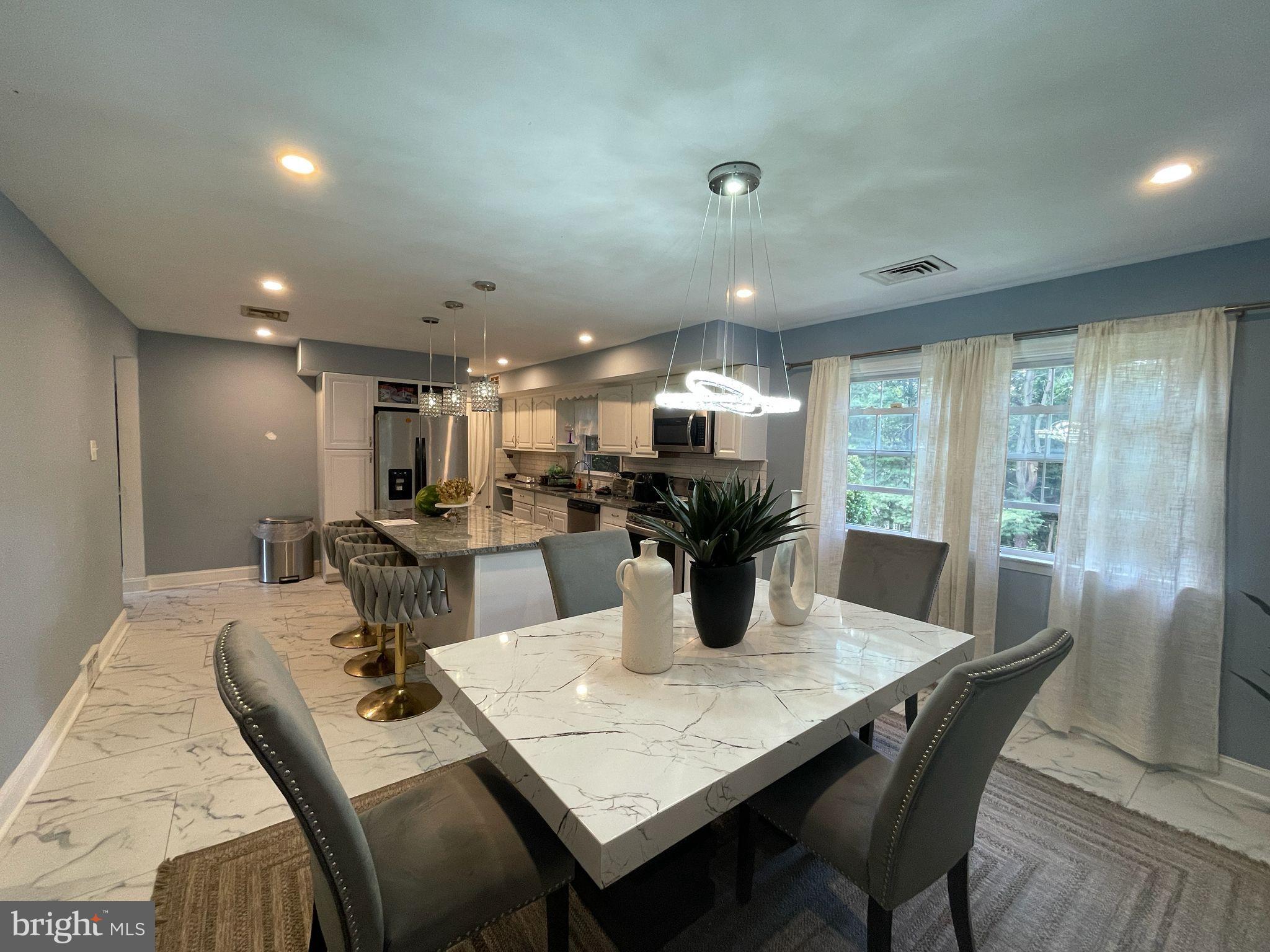 464 Conard Drive Springfield, PA 19064 - Photo 4 of 22 Modern kitchen with elegant dining area.