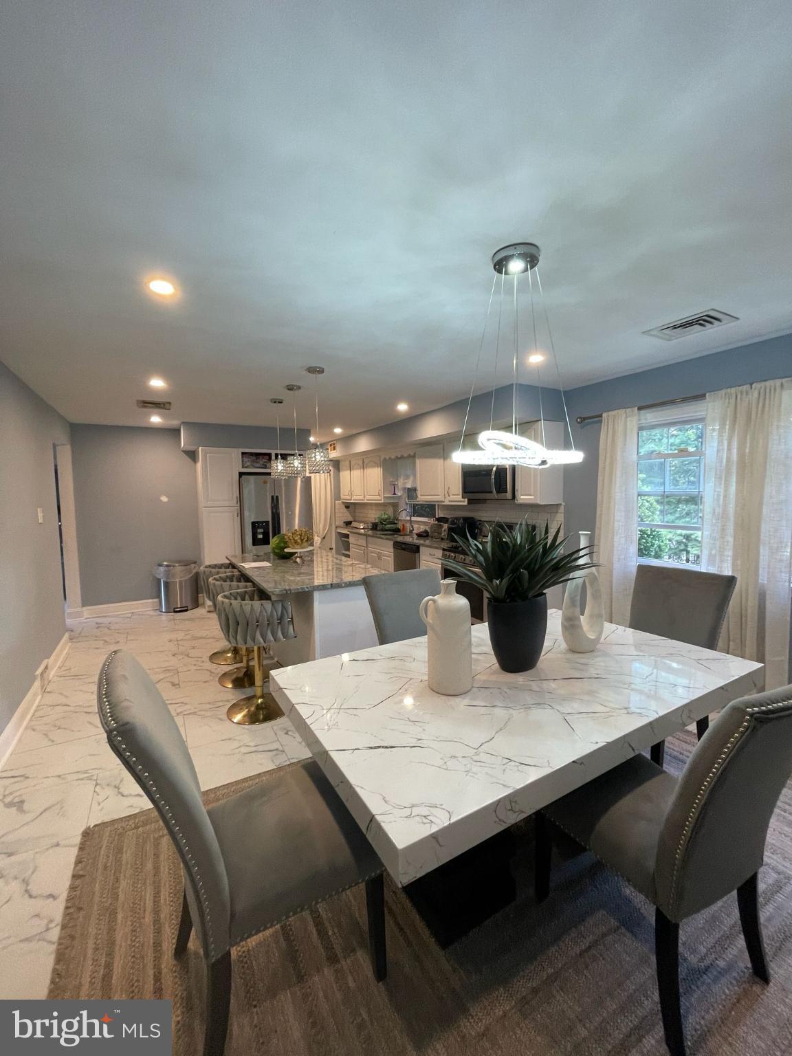 464 Conard Drive Springfield, PA 19064 - Photo 5 of 22 Modern elegance in a bright dining space.