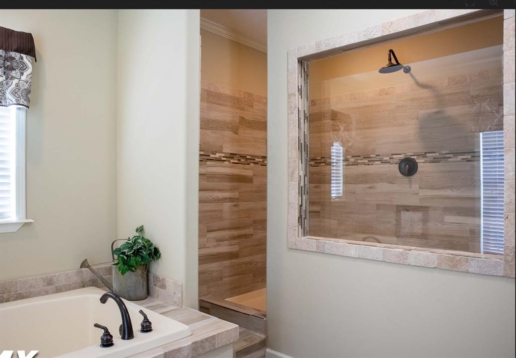 3 Vickie Court Chico, TX 76431 - Photo 16 of 17 a bathroom with a bathtub and shower