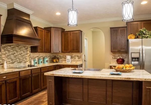 a bathroom with a sink double vanity and a mirror