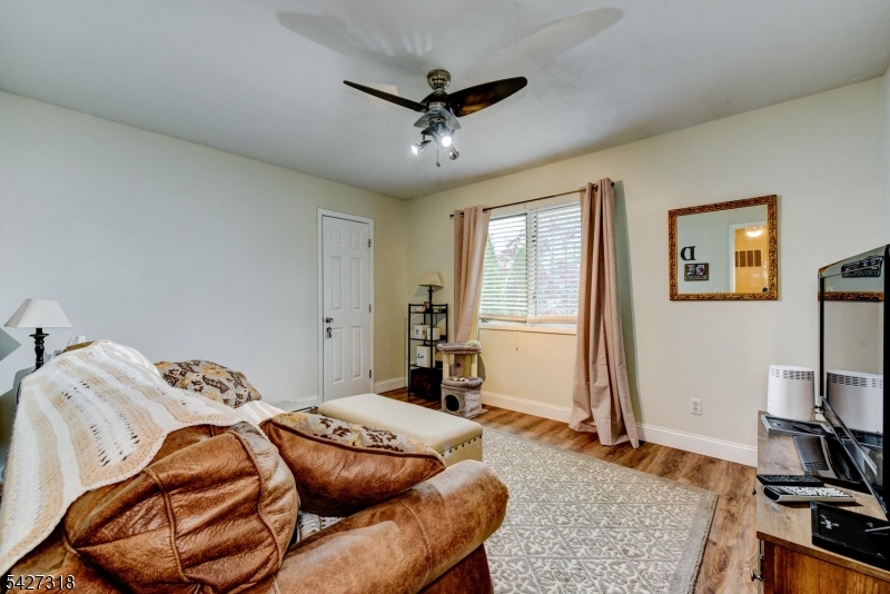 52 Ashburn Road Wayne, NJ 07470 - Photo 32 of 49 a bedroom with bed and a window