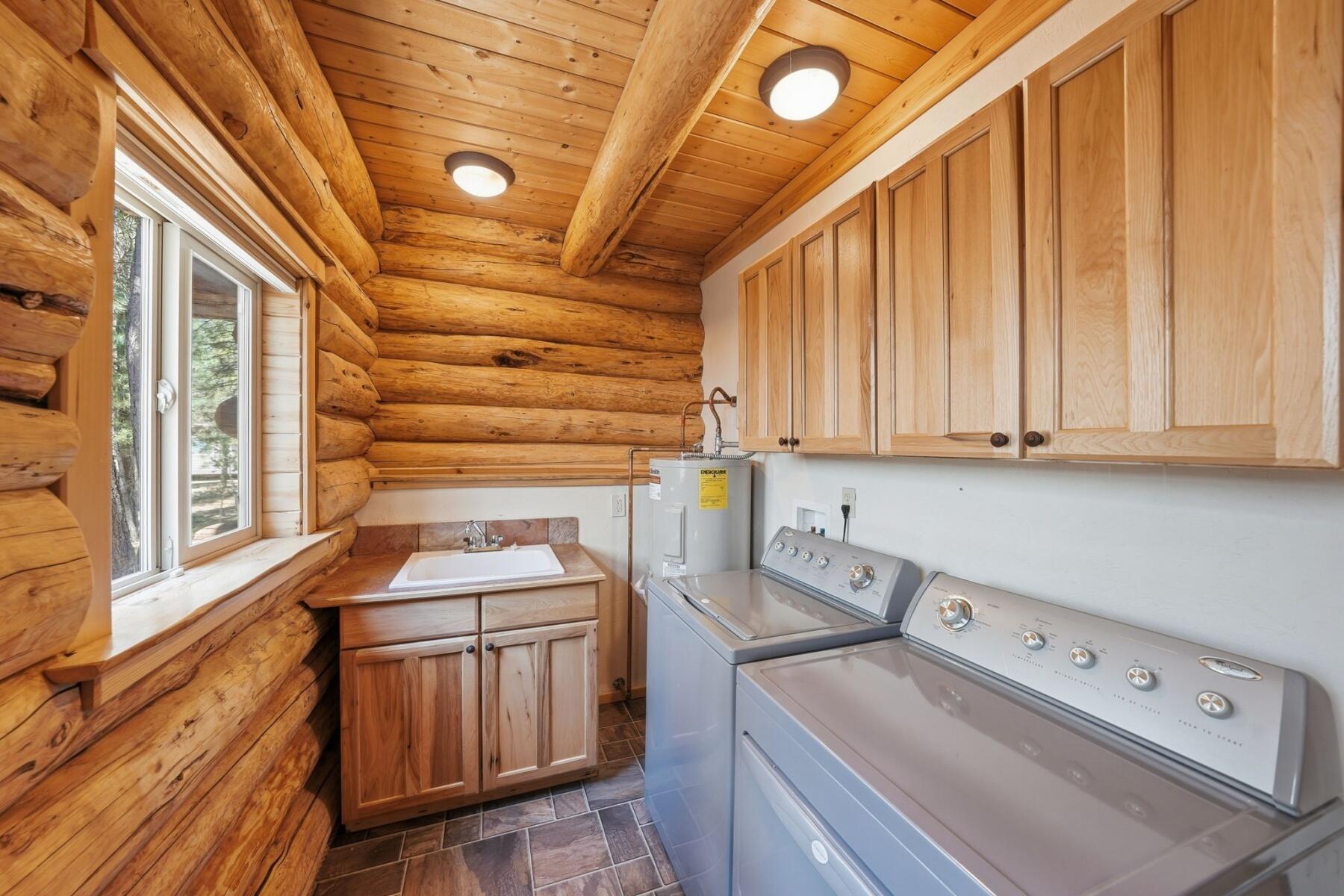 14177 Whitewater Loop La Pine, OR 97739 - Photo 13 of 38 a utility room with dryer and washer