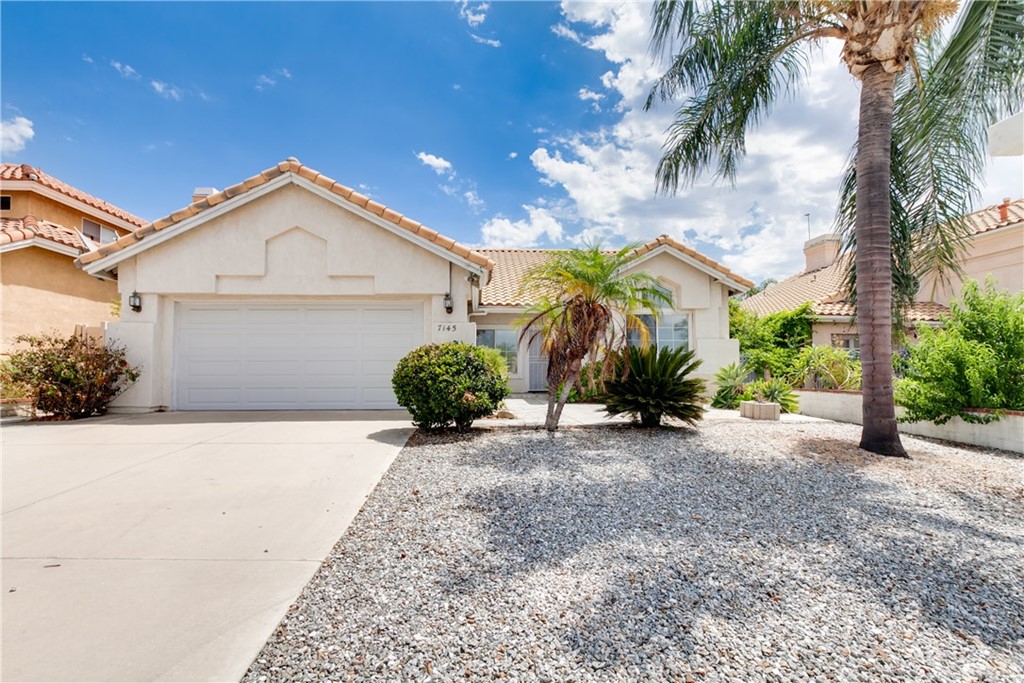 7145 Yarnell Road Highland, CA 92346 - Photo 1 of 1 a view of a house with a sink and garden
