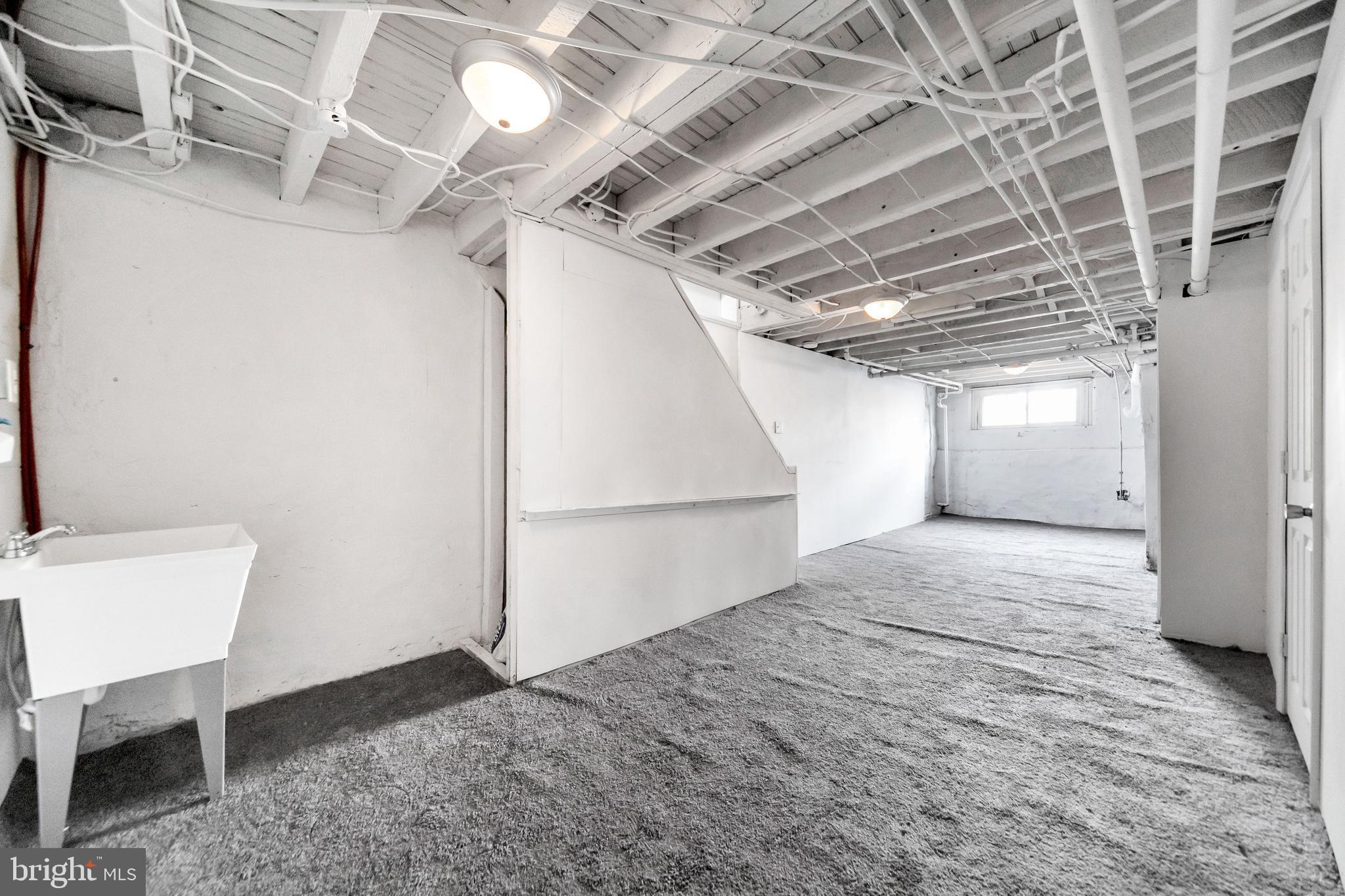 244 Wembly Road Upper Darby, PA 19082 - Photo 26 of 26 a view of a hallway with wooden floor