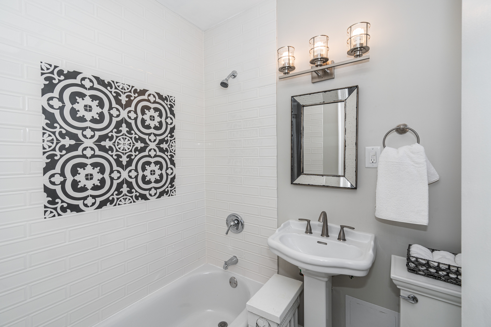 5510 North Sheridan Road, Unit 10A Chicago, IL 60640 - Photo 14 of 40 a bathroom with a sink and a mirror