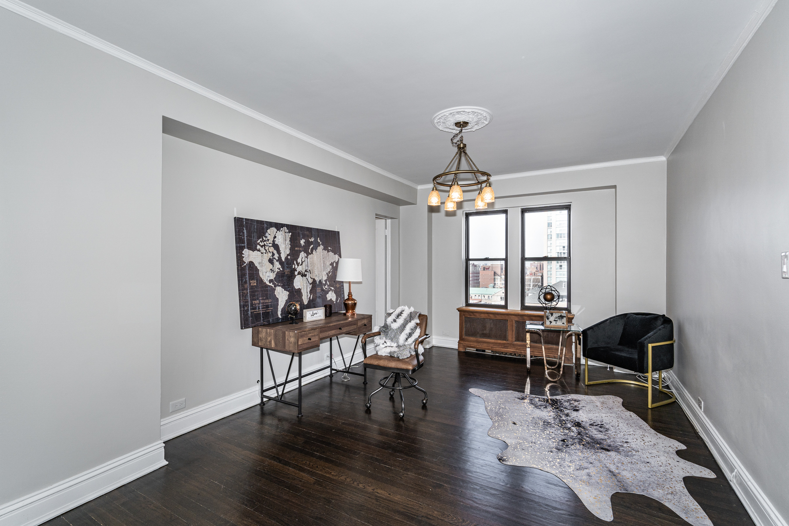 5510 North Sheridan Road, Unit 10A Chicago, IL 60640 - Photo 15 of 40 a view of a livingroom with furniture window and wooden floor