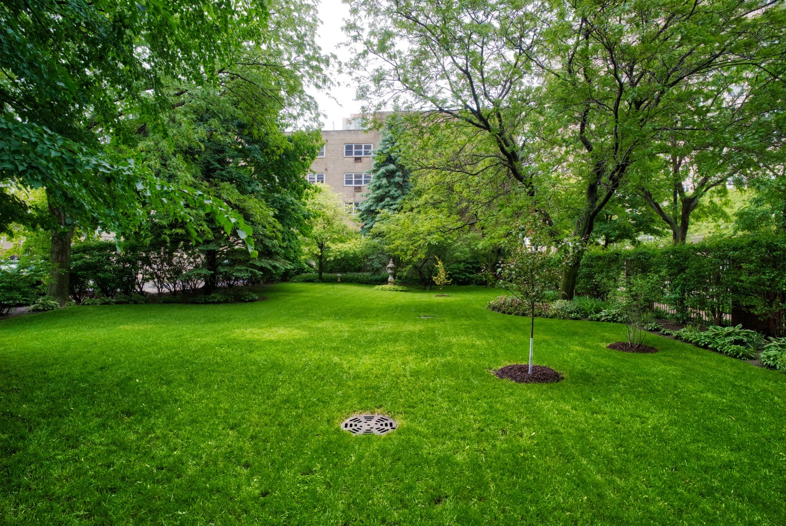 5510 North Sheridan Road, Unit 10A Chicago, IL 60640 - Photo 22 of 40 a view of green field with trees in the background