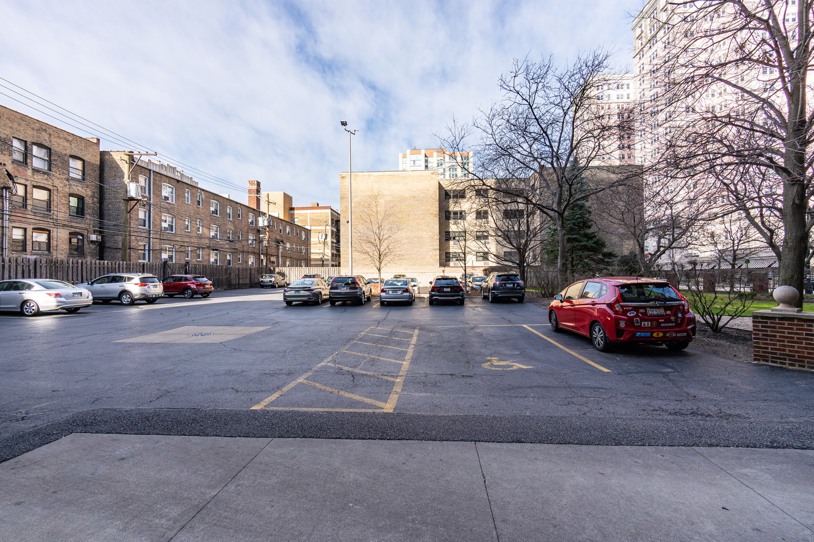 5510 North Sheridan Road, Unit 10A Chicago, IL 60640 - Photo 30 of 40 a car parked in front of a building