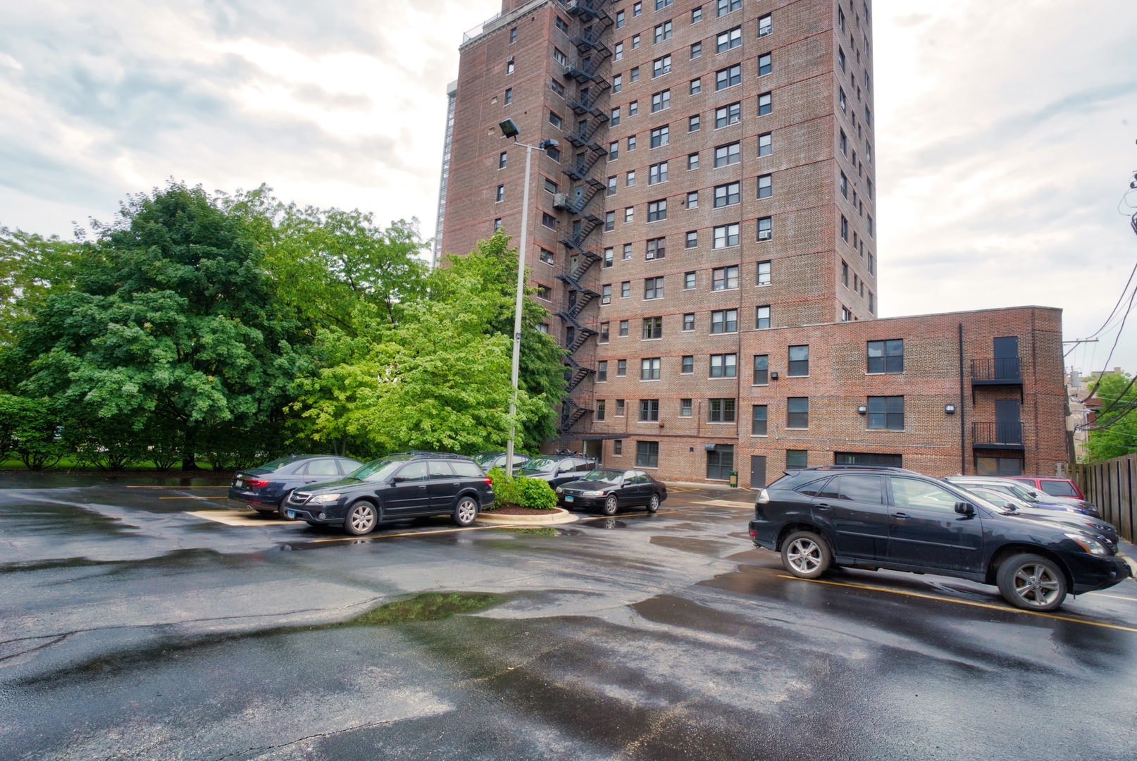 5510 North Sheridan Road, Unit 10A Chicago, IL 60640 - Photo 32 of 40 a car parked in front of a building
