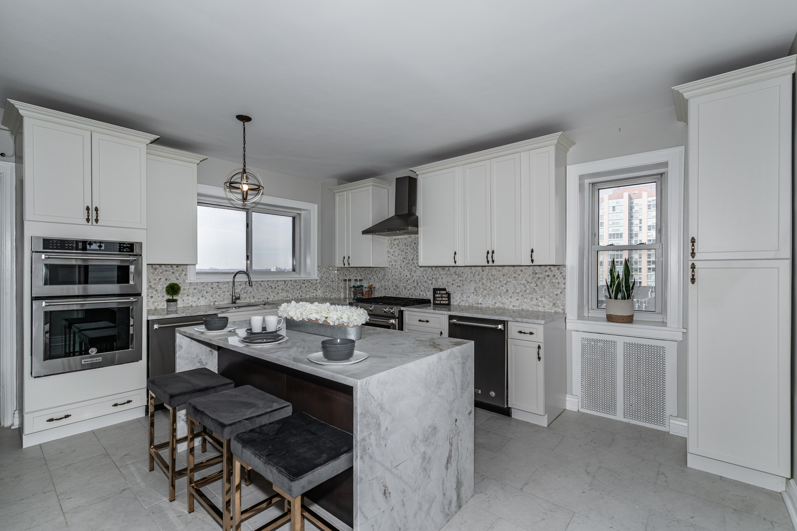5510 North Sheridan Road, Unit 10A Chicago, IL 60640 - Photo 7 of 40 a kitchen with a stove a sink and a refrigerator