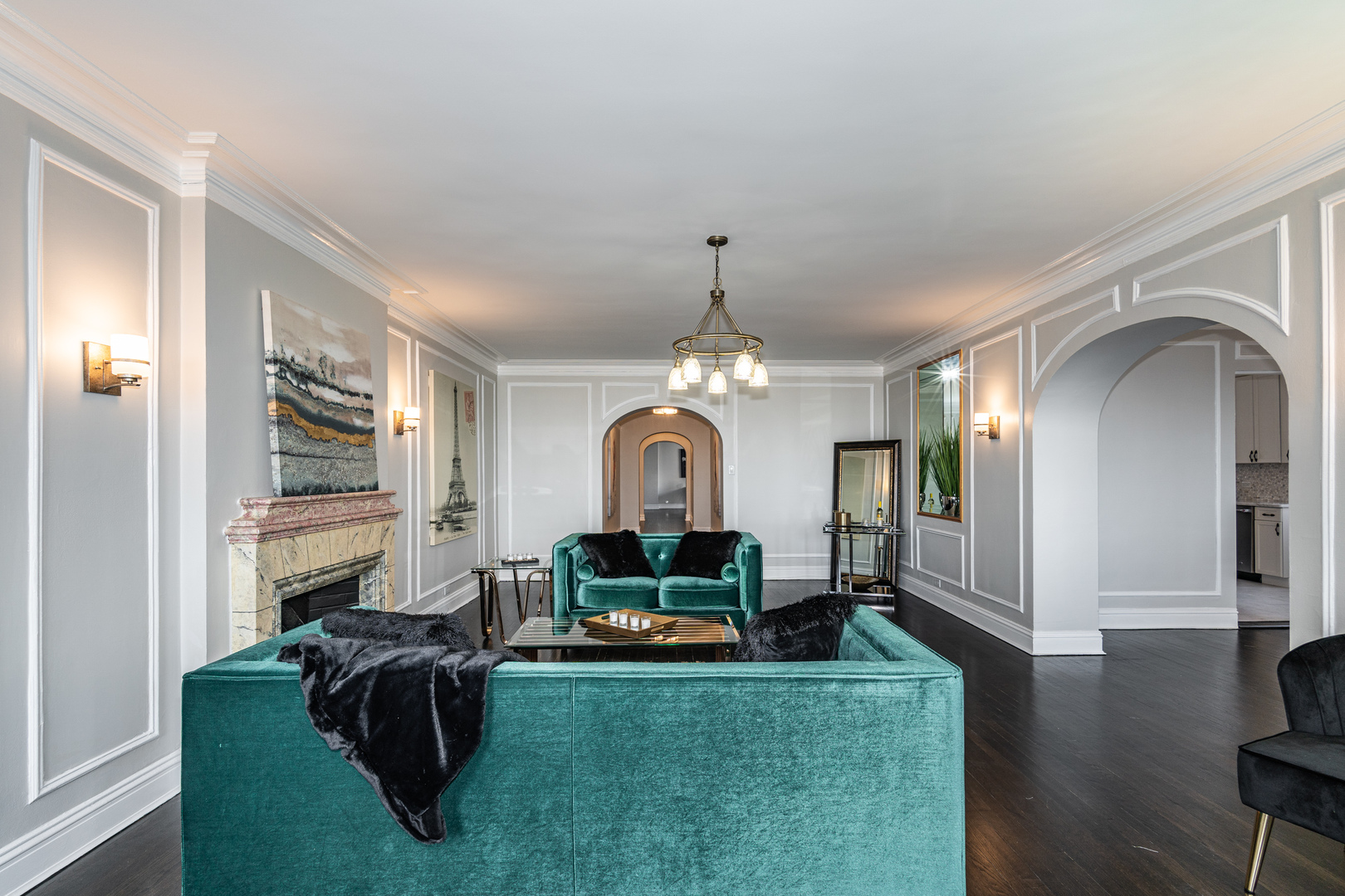 5510 North Sheridan Road, Unit 10A Chicago, IL 60640 - Photo 10 of 40 a living room with furniture and a chandelier