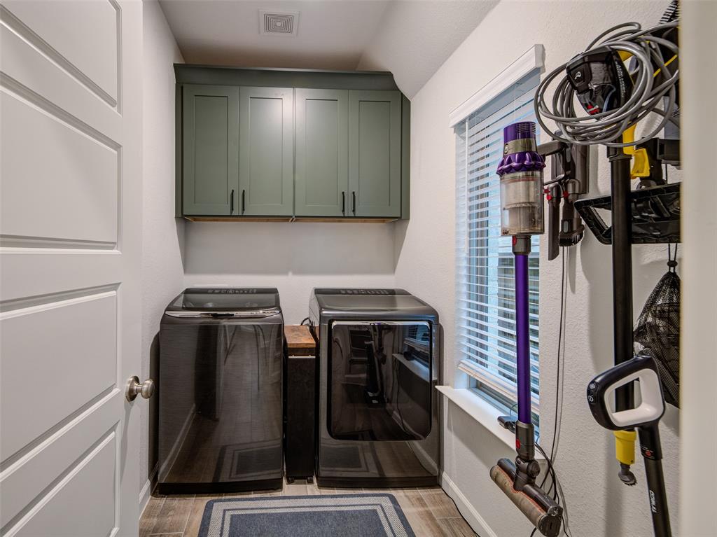162 Palo Duro Bend Rhome, TX 76078 - Photo 22 of 25 Spacious laundry room with custom soft close cabinets