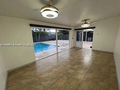 14331 Southwest 286th Street Homestead, FL 33033 - Photo 12 of 18 wooden floor in an empty room
