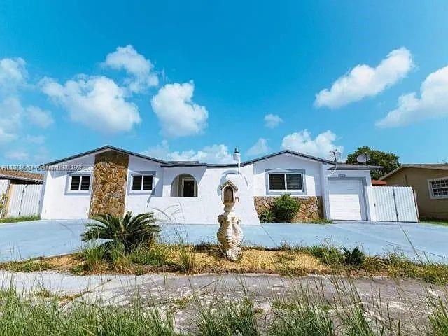 14331 Southwest 286th Street Homestead, FL 33033 - Photo 18 of 18 a front view of a house with a yard